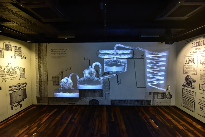 Exhibit on the Pistorius still in Gallery 2 of the Polish Vodka Museum, with historic illustrations and an illuminated distillation diagram