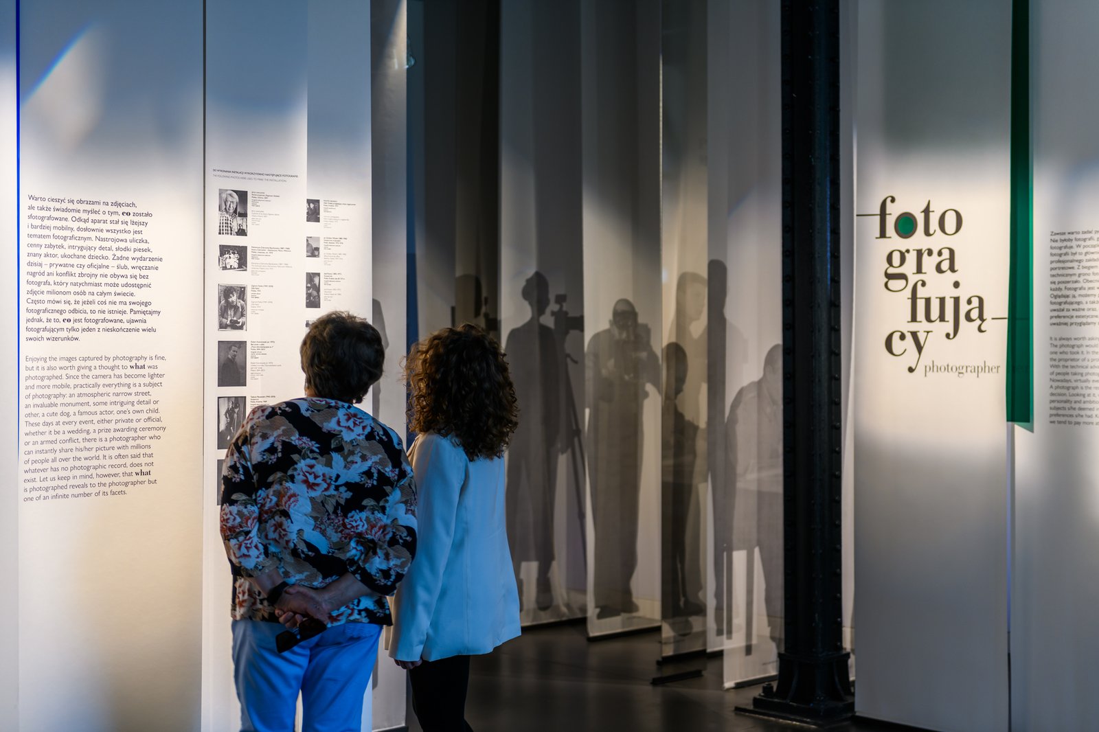 Two visitors at the “fotografujący” (photographers) section of the exhibition at the Museum of Photography in Krakow, Rakowicka street