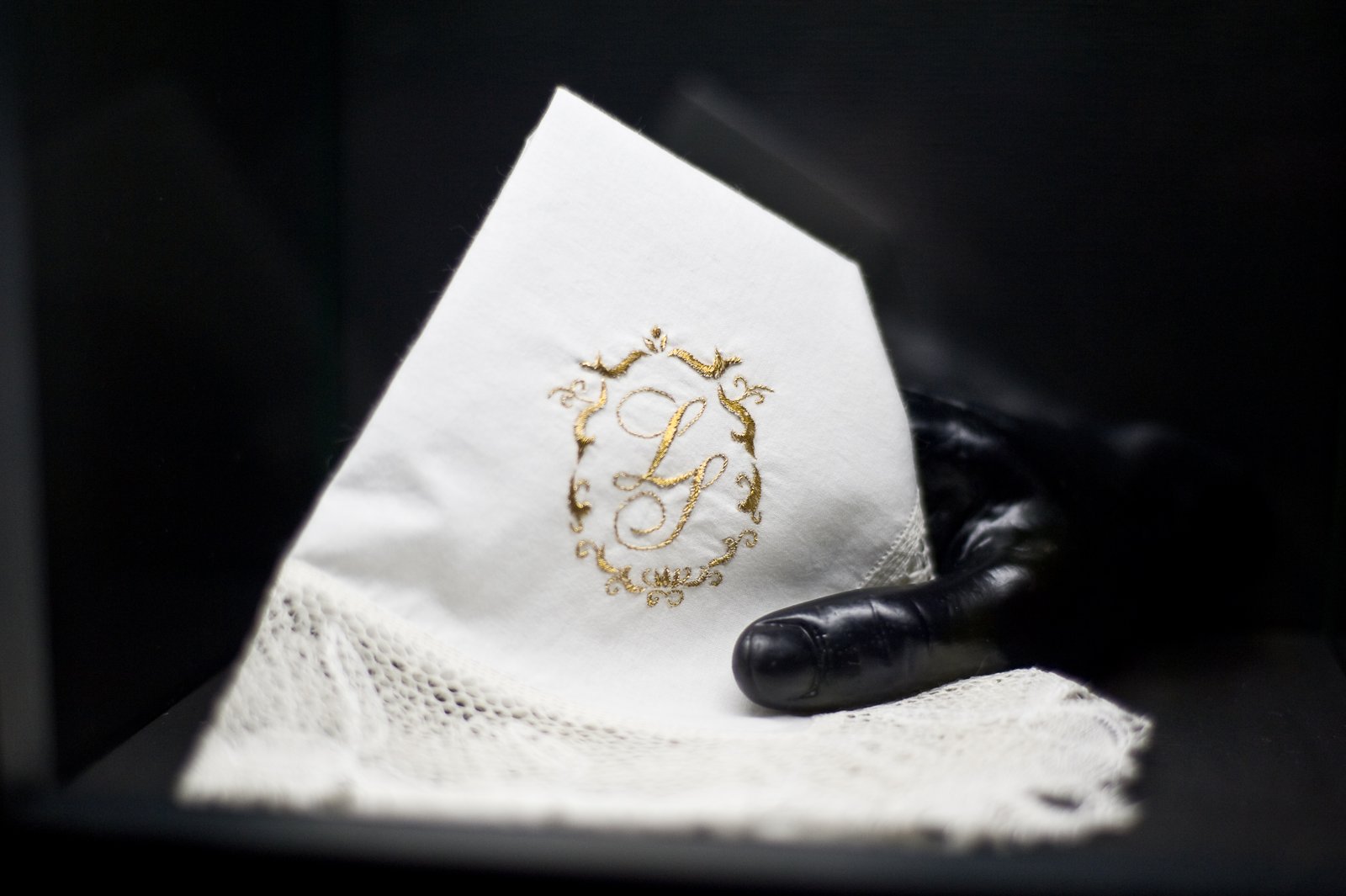 An embroidered handkerchief with a monogram in a showcase of the Kościuszko Museum in Krakow